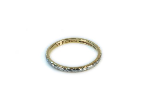Lot 1 - A 22ct gold hand engraved wedding ring