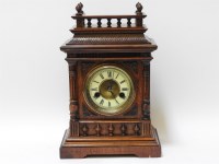 Lot 1474 - An early 20th century German walnut cased mantel clock