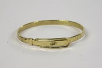 Lot 1010 - An Italian 9ct gold buckle bangle
12.92g