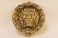 Lot 1126 - A large brass door knocker