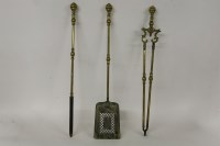Lot 1462 - A set of three Georgian brass fire irons