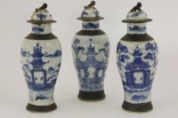 Lot 1481 - A garnaiture of three Chinese blue and white vases
