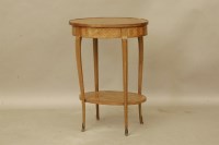 Lot 567 - A 19th century Continental parquetry inlaid oval occasional table
