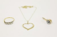 Lot 17 - A gold five stone illusion set diamond ring