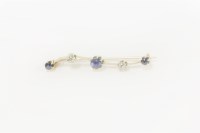 Lot 1 - A gold sapphire and diamond five stone bar brooch