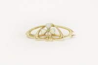 Lot 8 - An Art Nouveau gold brooch