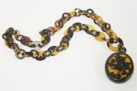 Lot 52 - A Victorian tortoiseshell locket