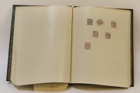 Lot 149 - A green simplex stamp album