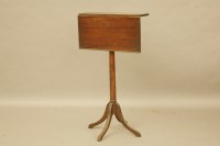 Lot 551 - An Early 19th Century mahogany reading stand on turned support and four out swept feet