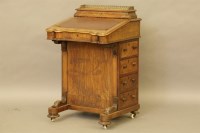 Lot 468 - A Victorian inlaid walnut Davenport