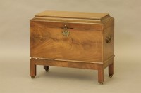 Lot 486 - A George III walnut wine cooler