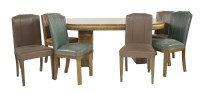 Lot 501 - An Art Deco walnut dining room suite