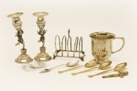 Lot 77 - A pair of 830 silver dwarf candlesticks