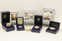 Lot 75 - A collection of eight Halcyon Days enamel trinket boxes
