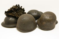 Lot 333 - Five various tin helmets