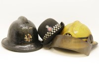 Lot 343 - A quantity of old helmets