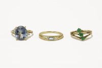 Lot 37 - A 9ct gold three stone emerald ring