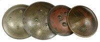 Lot 1458 - An Indian steel and gold inlaid dhal shield