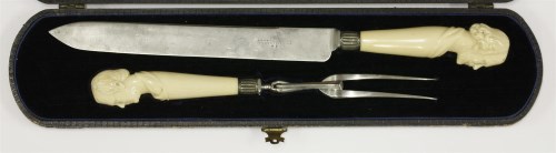 Lot 41 - A pair of Victorian figural ivory carvers