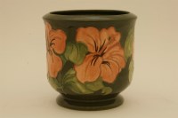 Lot 1215 - A Moorcroft 'Hibiscus' pattern jardiniere