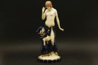 Lot 383 - An Art Deco Royal Dux group of a dancer and a boy