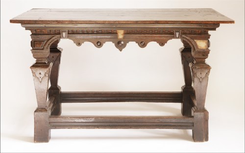 Lot 84 - A Continental oak serving table