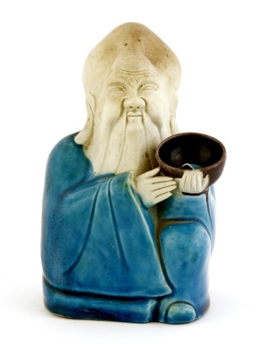 Lot 1102 - A porcelain water dropper