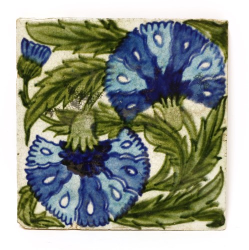 Lot 32 - A William De Morgan pottery carnation tile