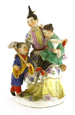 Lot 269 - A Meissen porcelain malabar figure group