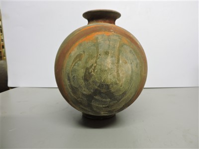 Lot 13 - A Chinese earthenware cocoon jar