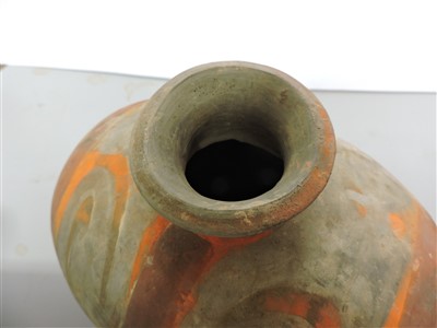 Lot 13 - A Chinese earthenware cocoon jar