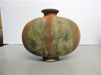 Lot 13 - A Chinese earthenware cocoon jar