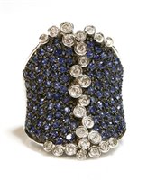 Lot 290 - A Continental white gold diamond and sapphire saddle ring
