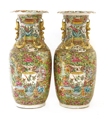 Lot 44 - A pair of Chinese Canton enamelled famille rose vases