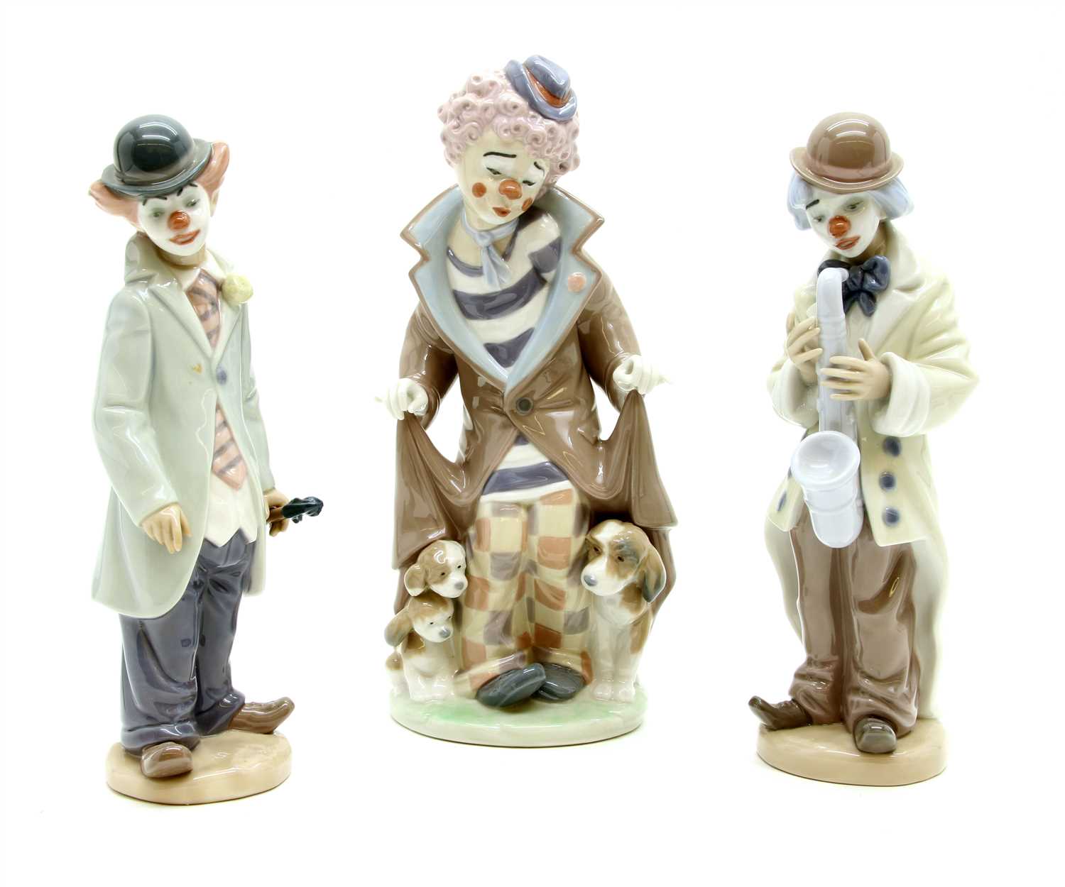 Lot 129 - Three Lladro figures of clowns