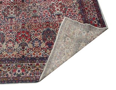 Lot 36 - A Kirman carpet