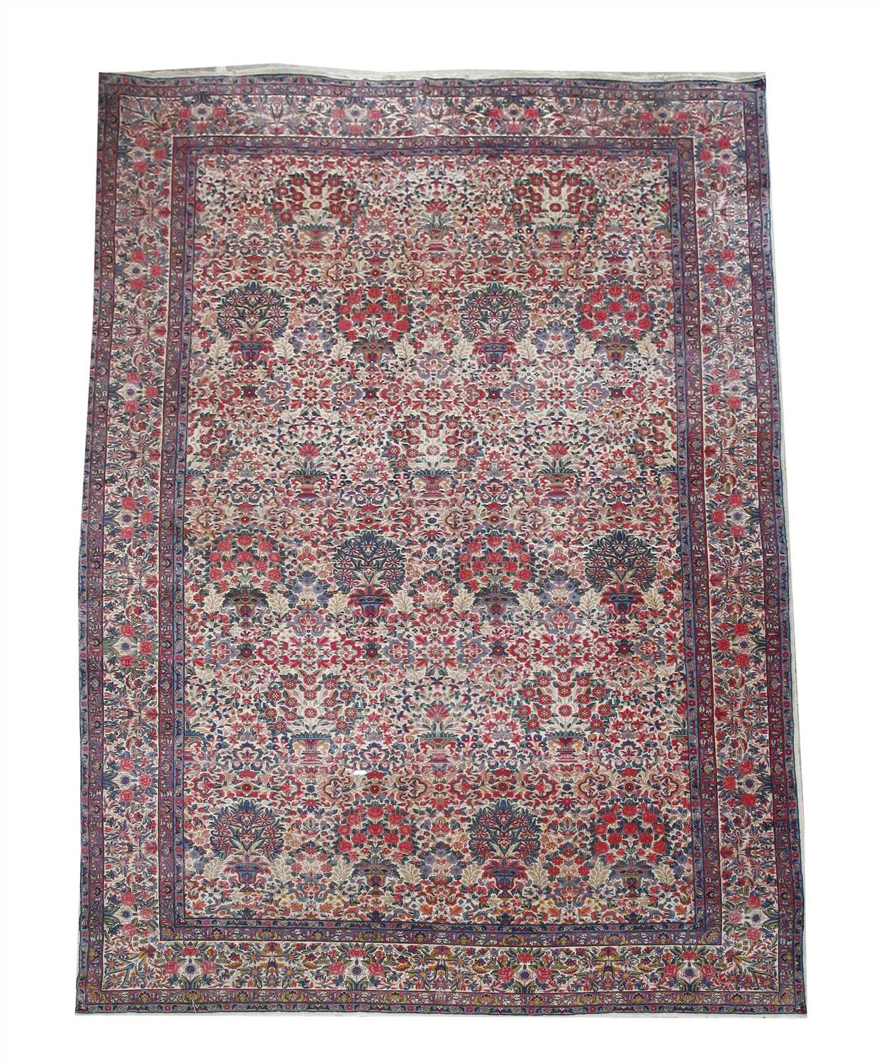 Lot 36 - A Kirman carpet