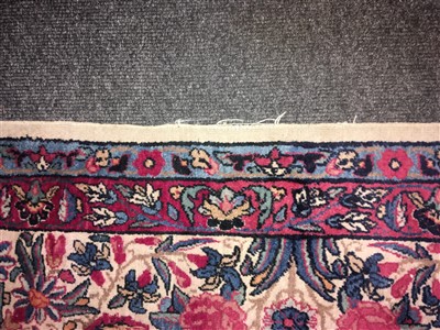 Lot 36 - A Kirman carpet