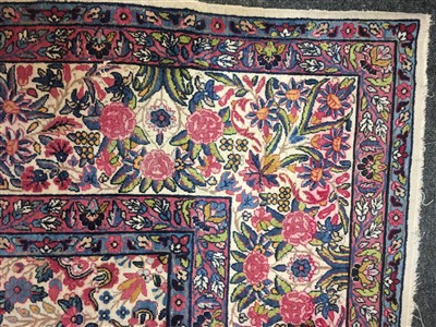 Lot 36 - A Kirman carpet