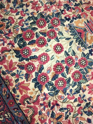 Lot 36 - A Kirman carpet