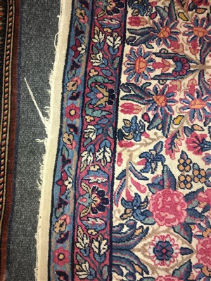 Lot 36 - A Kirman carpet