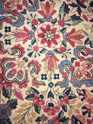 Lot 36 - A Kirman carpet