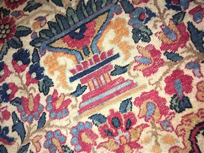 Lot 36 - A Kirman carpet