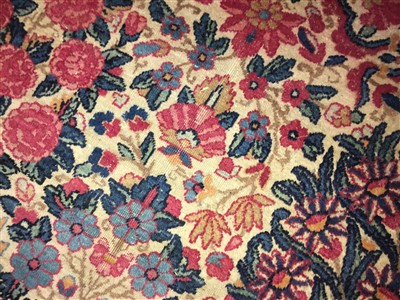 Lot 36 - A Kirman carpet