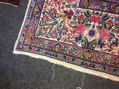 Lot 36 - A Kirman carpet