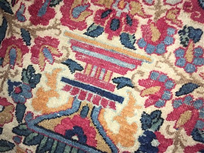 Lot 36 - A Kirman carpet
