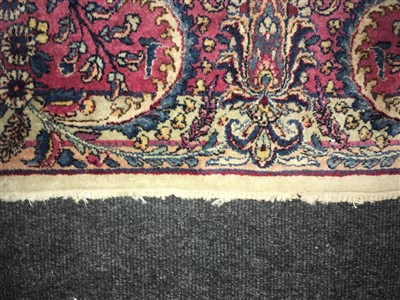 Lot 36 - A Kirman carpet