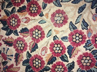 Lot 36 - A Kirman carpet