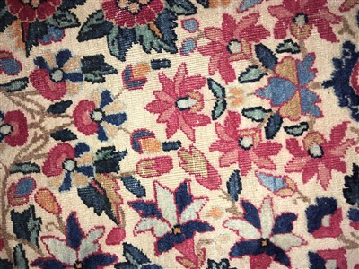Lot 36 - A Kirman carpet