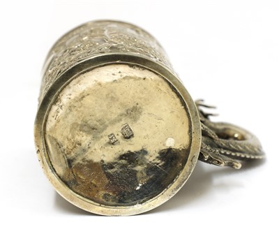 Lot 129 - A Chinese silver mug